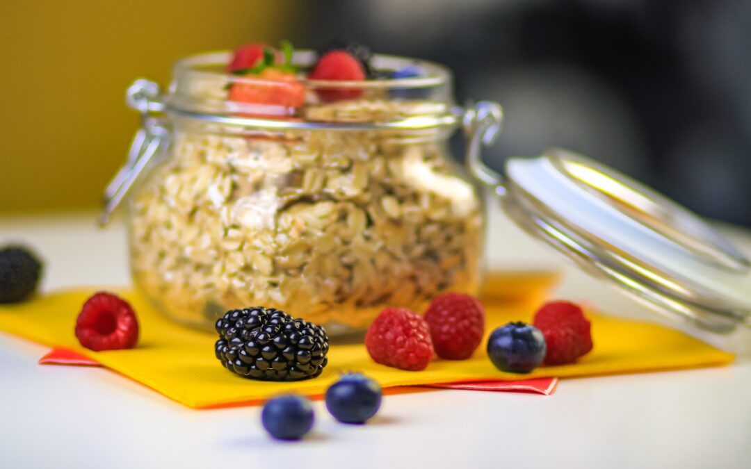 jar of oats topped with berries